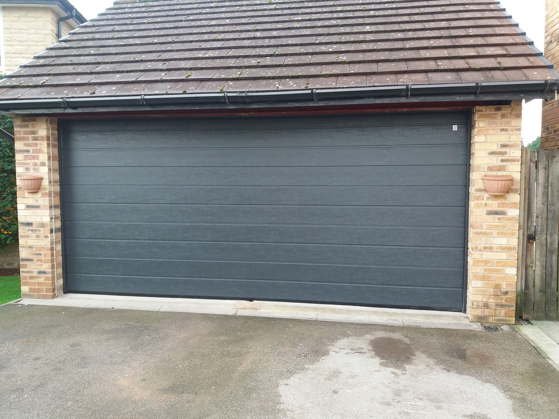 Sectional garage door